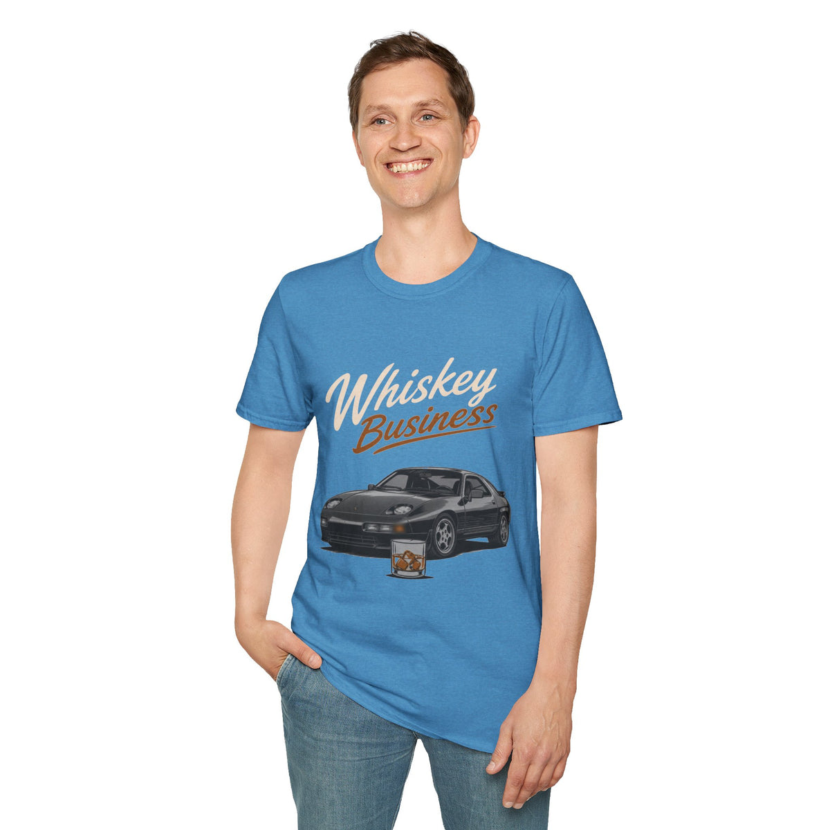 Whiskey Business Shirt, Heather Sapphire blue, worn by a standing model with one hand in their pocket